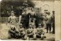 Seresini Nicola - foto in divisa di servizio, primo in piedi da sinistra, ritratto in gruppo addetto alla bonifica degli ex campi di battaglia(?). Fu trattenuto in servizio fino al settembre 1919.